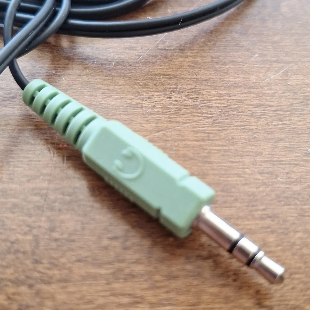 Pink Microphone and Green Audio Cable